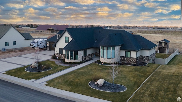 743 N 1100 E, Nephi, UT 84648 - view of front of home with a garage, driveway, a shingled roof, and a front yard