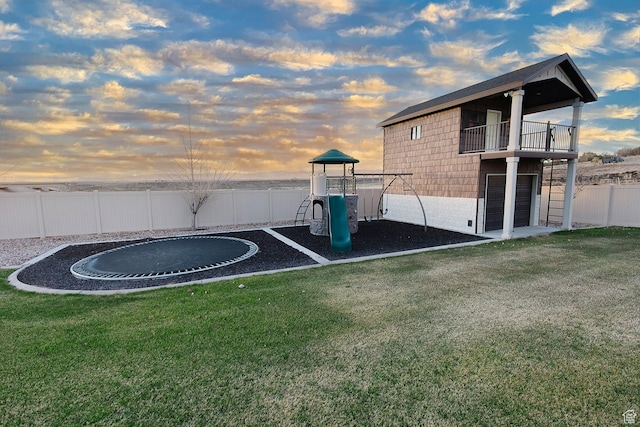 743 N 1100 E, Nephi, UT 84648 - view of yard featuring a fenced backyard, a balcony, and a playground