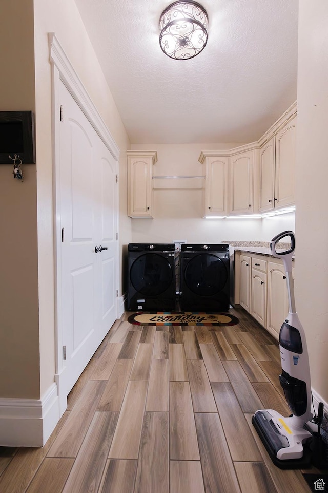 743 N 1100 E, Nephi, UT 84648 - laundry area with baseboards, cabinet space, light wood-type flooring, and independent washer and dryer