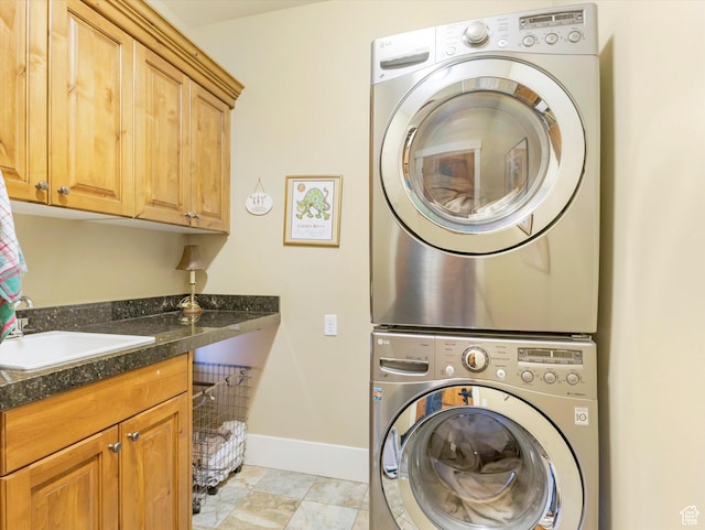 1628 E Viewside Cir, Hideout, UT 84036 - laundry area featuring cabinets, stacked washing maching and dryer, and sink