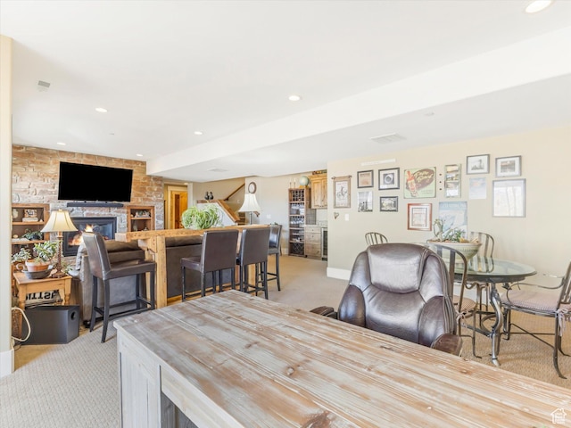 1628 E Viewside Cir, Hideout, UT 84036 - dining space with light carpet and a fireplace