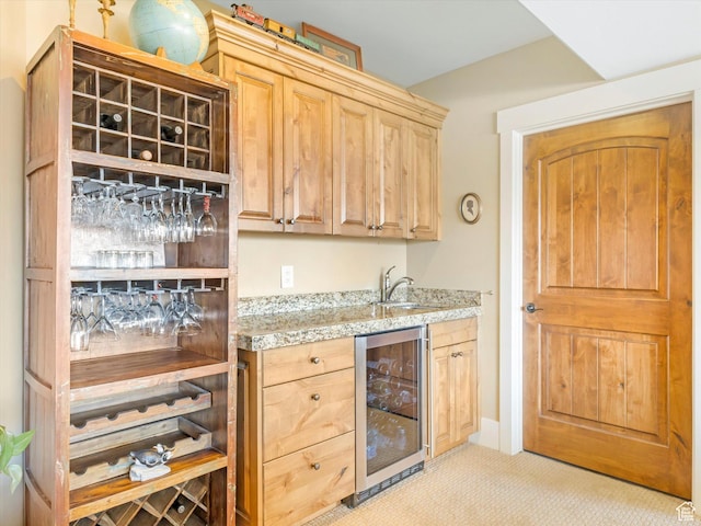 1628 E Viewside Cir, Hideout, UT 84036 - bar featuring light stone countertops, light brown cabinets, beverage cooler, and sink