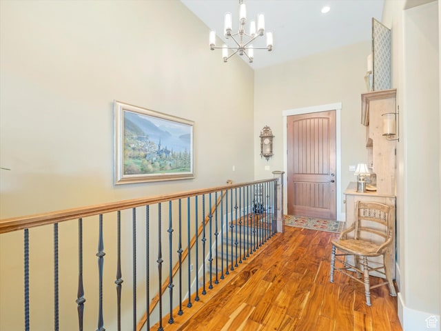 1628 E Viewside Cir, Hideout, UT 84036 - hallway featuring a chandelier and hardwood / wood-style flooring