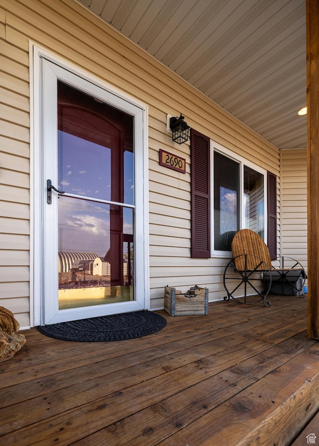 2690 W 500 N, Vernal, UT 84078 - deck at dusk featuring covered porch