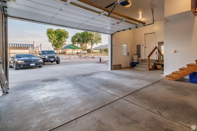 2690 W 500 N, Vernal, UT 84078 - garage at dusk with a garage door opener