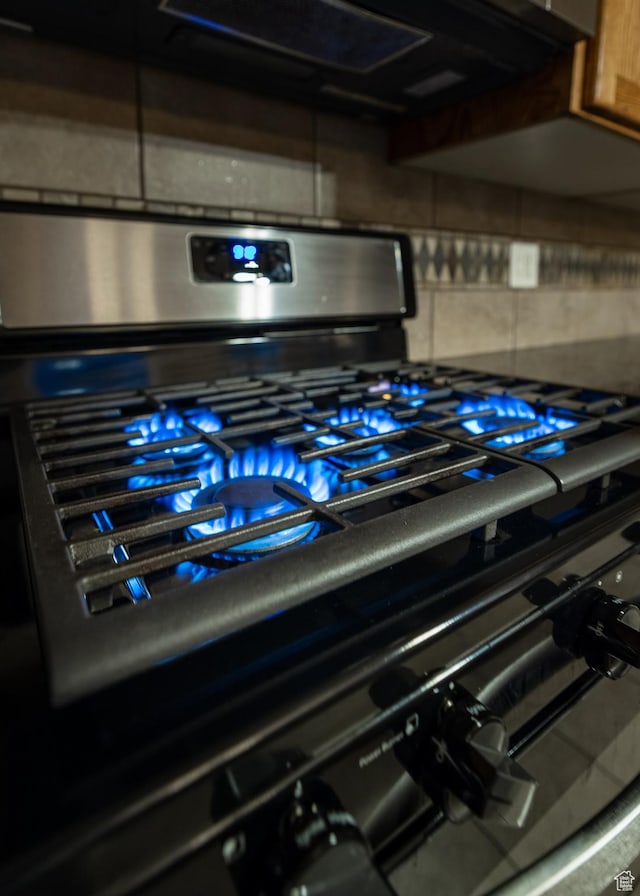2690 W 500 N, Vernal, UT 84078 - room details featuring backsplash and stainless steel range with gas cooktop