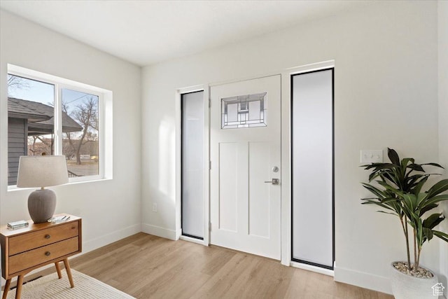 246 E 2100 S, South Salt Lake, UT 84115 - foyer with light wood-type flooring and baseboards