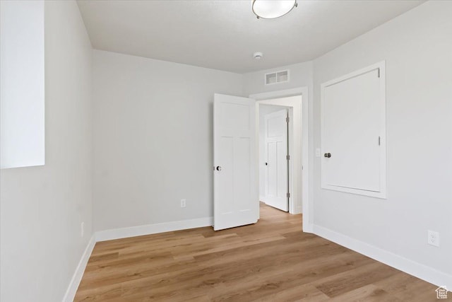 246 E 2100 S, South Salt Lake, UT 84115 - unfurnished bedroom with light wood-style floors