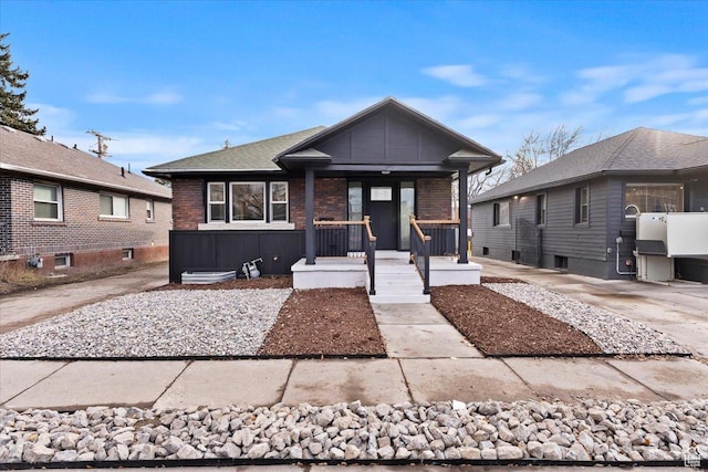 246 E 2100 S, South Salt Lake, UT 84115 - view of front facade with covered porch and brick siding