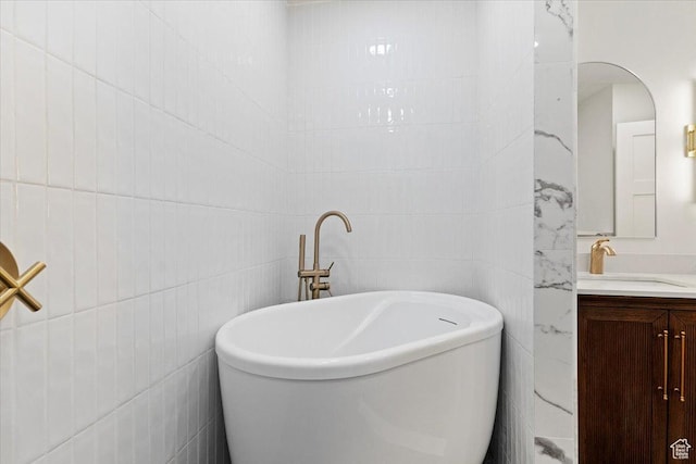 246 E 2100 S, South Salt Lake, UT 84115 - bathroom with a freestanding tub, vanity, and tile walls