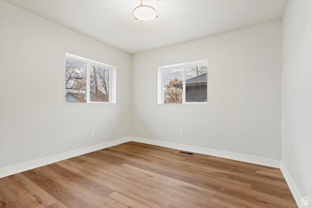 246 E 2100 S, South Salt Lake, UT 84115 - spare room with baseboards and light wood-style flooring