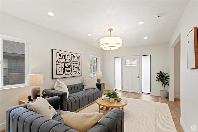 246 E 2100 S, South Salt Lake, UT 84115 - living area with light wood-style flooring and recessed lighting