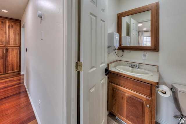 558 Winesap Cir, Moab, UT 84532 - half bath featuring vanity and wood finished floors