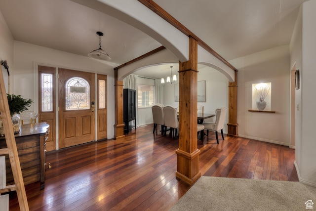558 Winesap Cir, Moab, UT 84532 - entryway with dark wood-type flooring and a notable chandelier