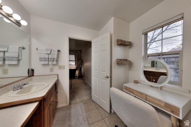 558 Winesap Cir, Moab, UT 84532 - bathroom with vanity, tile patterned flooring, and ensuite bath