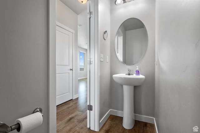 248 W Quartz Rd, Tooele, UT 84074 - bathroom featuring wood finished floors and baseboards