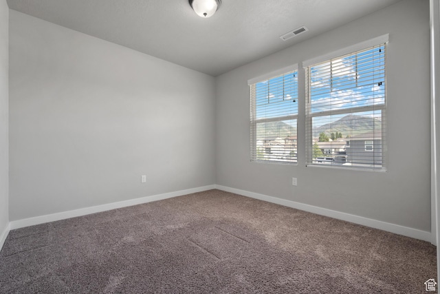 248 W Quartz Rd, Tooele, UT 84074 - carpeted spare room featuring baseboards