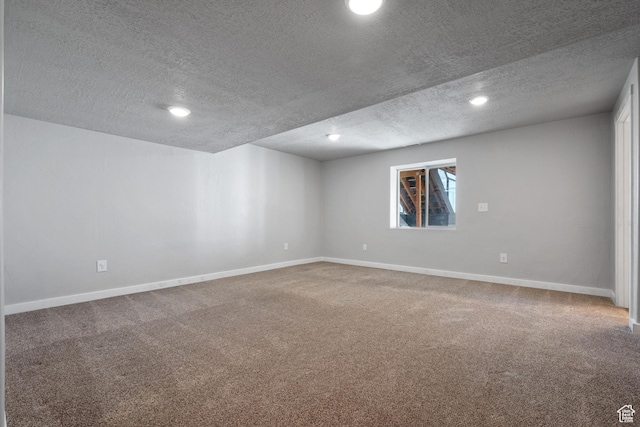 248 W Quartz Rd, Tooele, UT 84074 - unfurnished room featuring a textured ceiling, carpet floors, baseboards, and recessed lighting