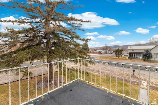 balcony featuring a mountain view