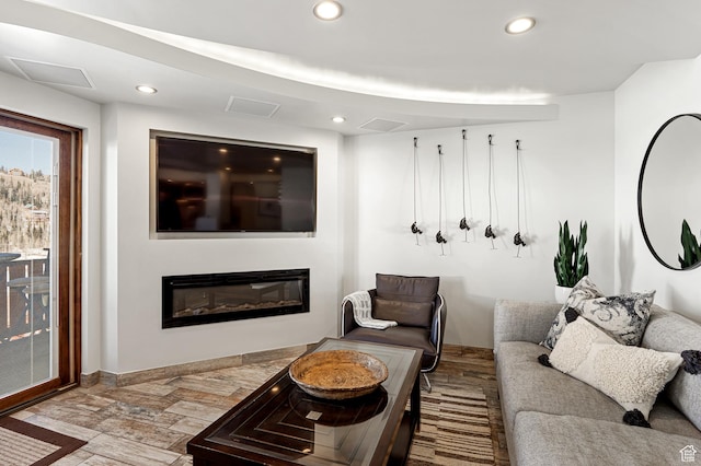 561 S Vasels Rd Unit R16-C, Brian Head, UT 84719 - living room featuring recessed lighting, baseboards, wood finished floors, and a glass covered fireplace