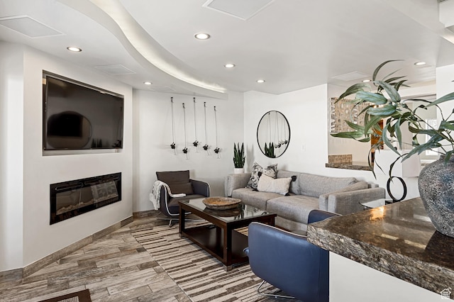 561 S Vasels Rd Unit R16-C, Brian Head, UT 84719 - living room featuring recessed lighting, baseboards, wood finished floors, and a glass covered fireplace