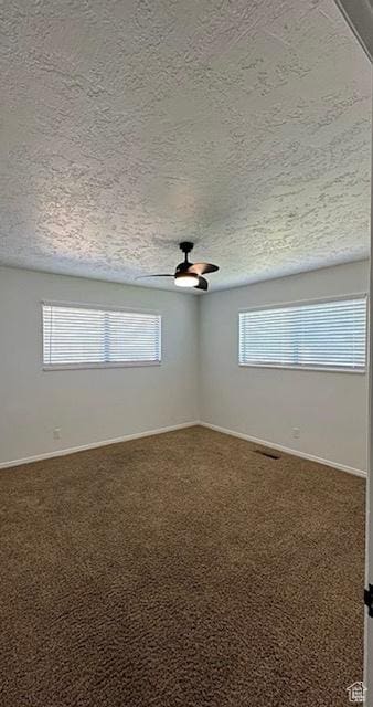 722 Staheli Dr, Washington, UT 84780 - carpeted spare room featuring ceiling fan and a textured ceiling