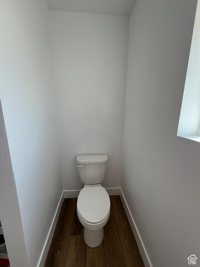 1241 N 3500 E, Ballard, UT 84066 - bathroom featuring baseboards, wood finished floors, and toilet