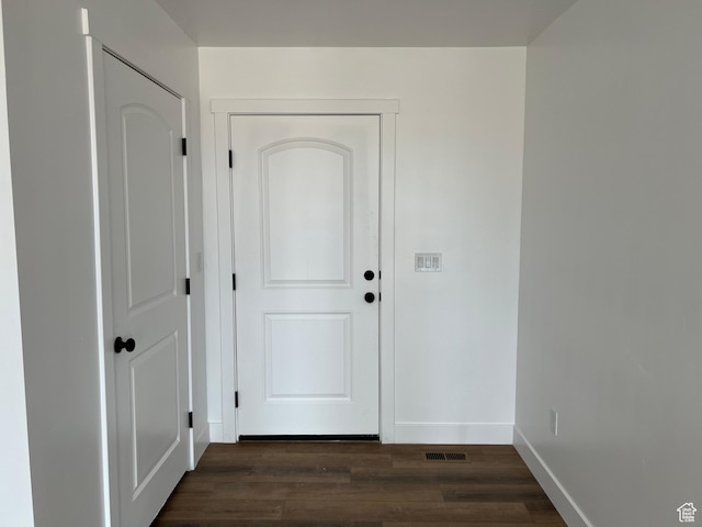 1241 N 3500 E, Ballard, UT 84066 - doorway to outside featuring dark wood-type flooring, visible vents, and baseboards