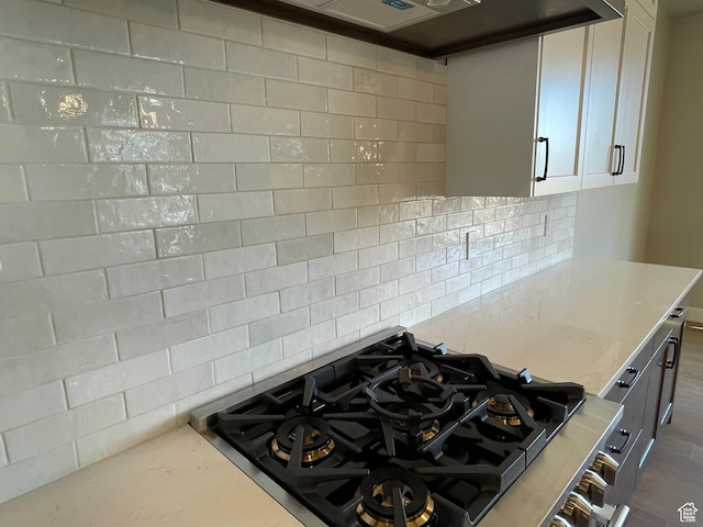 236 S 1100 E, Smithfield, UT 84335 - room details featuring tasteful backsplash, stovetop, and light stone countertops