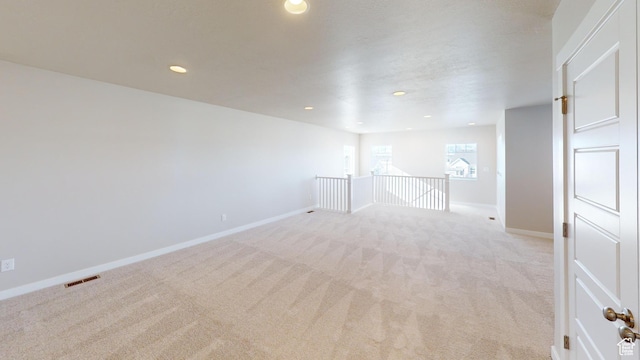 633 W Junegrass Ln, Stansbury Park, UT 84074 - empty room with light colored carpet