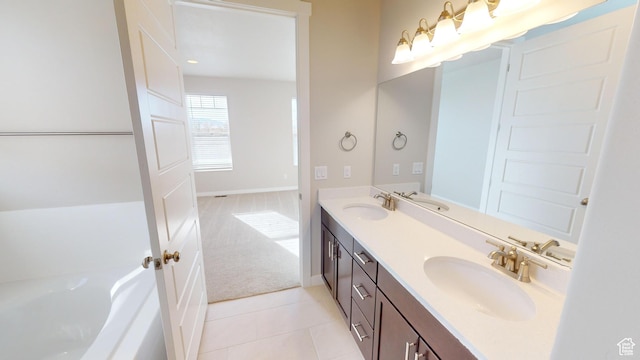 633 W Junegrass Ln, Stansbury Park, UT 84074 - bathroom with vanity, tile patterned floors, and a bathtub