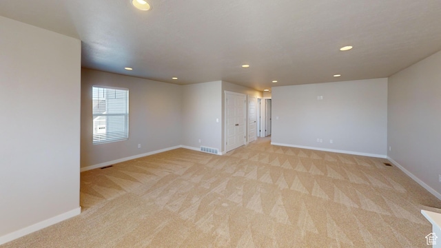 633 W Junegrass Ln, Stansbury Park, UT 84074 - unfurnished room with light colored carpet