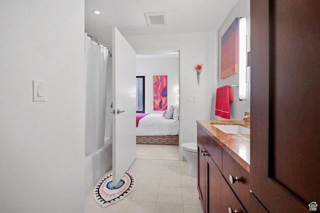 55 W S Temple Unit 204, Salt Lake City, UT 84101 - full bath featuring visible vents, toilet, tile patterned floors, vanity, and a shower with curtain