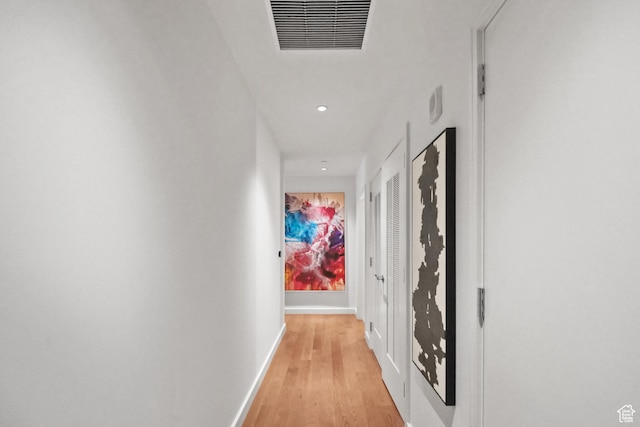 55 W S Temple Unit 204, Salt Lake City, UT 84101 - hall with light wood-style flooring, baseboards, and visible vents
