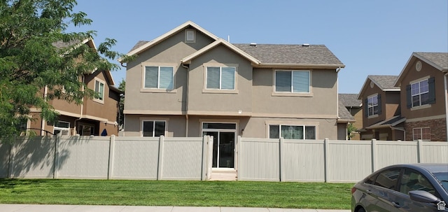 1036 N Darcy Dr W, North Salt Lake, UT 84054 - rear view of house with a lawn