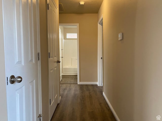 1036 N Darcy Dr W, North Salt Lake, UT 84054 - hallway featuring dark hardwood / wood-style floors