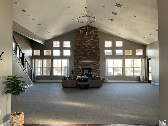 1036 N Darcy Dr W, North Salt Lake, UT 84054 - unfurnished living room featuring carpet flooring, a fireplace, a healthy amount of sunlight, and an inviting chandelier