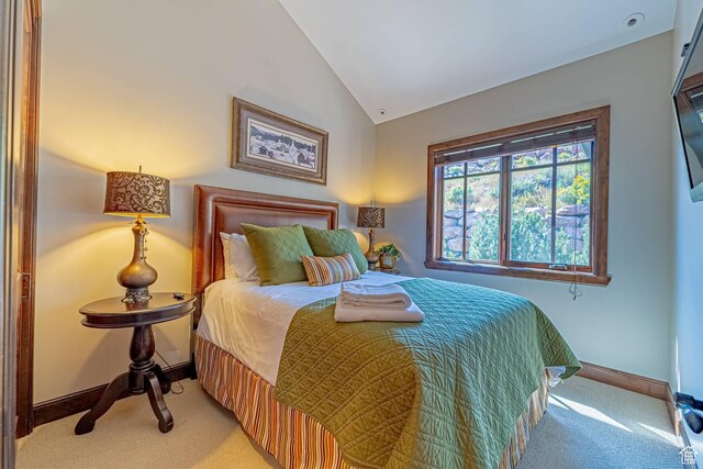 4129 Fairway Ln Unit A-3, Park City, UT 84098 - carpeted bedroom with vaulted ceiling