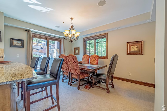 4129 Fairway Ln Unit A-3, Park City, UT 84098 - carpeted dining space with an inviting chandelier