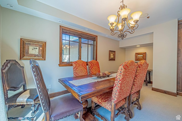 4129 Fairway Ln Unit A-3, Park City, UT 84098 - carpeted dining area featuring a tray ceiling and a chandelier