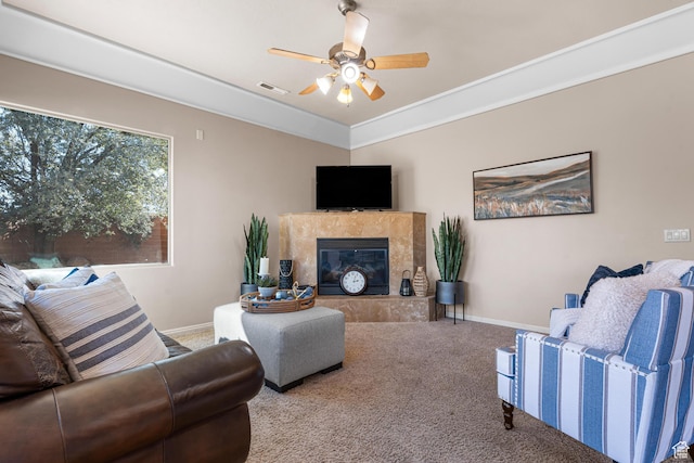2371 E 2830 S, St George, UT 84790 - carpeted living room featuring a tiled fireplace and ceiling fan