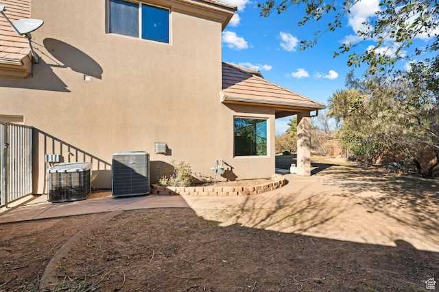 2371 E 2830 S, St George, UT 84790 - back of property featuring central AC unit and a patio area