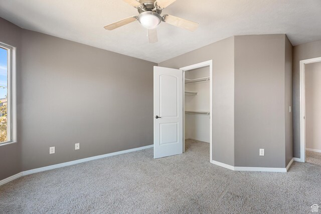 2371 E 2830 S, St George, UT 84790 - unfurnished bedroom featuring a closet, ceiling fan, and light colored carpet