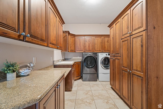 2371 E 2830 S, St George, UT 84790 - washroom with cabinets, light tile patterned floors, sink, and washing machine and clothes dryer