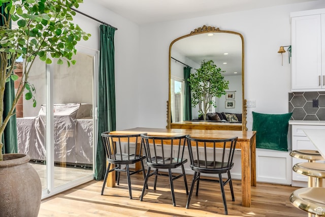dining room with light wood-type flooring