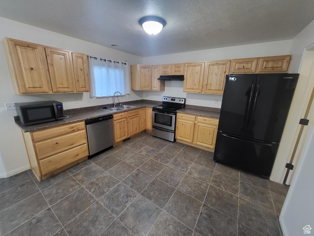 3318 E Quarter Mile Dr, Eagle Mountain, UT 84005 - kitchen with light brown cabinets, under cabinet range hood, a sink, black appliances, and dark countertops
