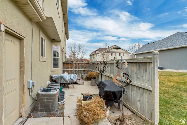 3318 E Quarter Mile Dr, Eagle Mountain, UT 84005 - view of patio featuring area for grilling, cooling unit, and fence