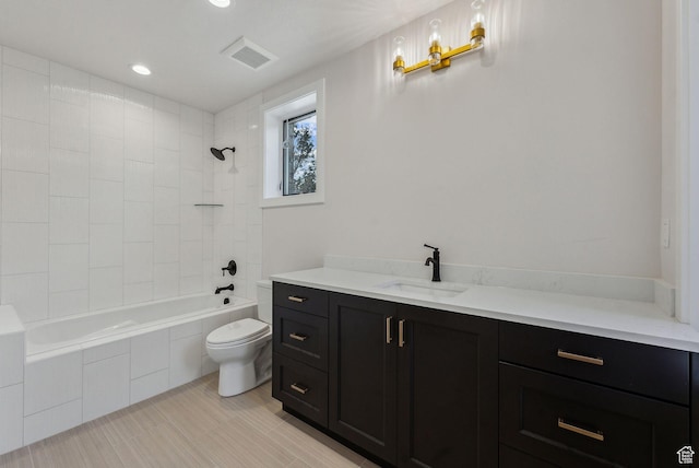 3097 E Corral Peak Cir Unit 145, Heber City, UT 84032 - bathroom with vanity, recessed lighting, toilet, visible vents, and tiled shower / bath combo