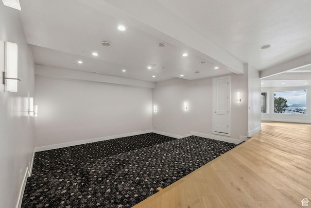 3097 E Corral Peak Cir Unit 145, Heber City, UT 84032 - spare room featuring recessed lighting, baseboards, and wood finished floors
