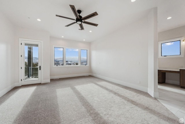 3097 E Corral Peak Cir Unit 145, Heber City, UT 84032 - empty room featuring a wealth of natural light, recessed lighting, and baseboards